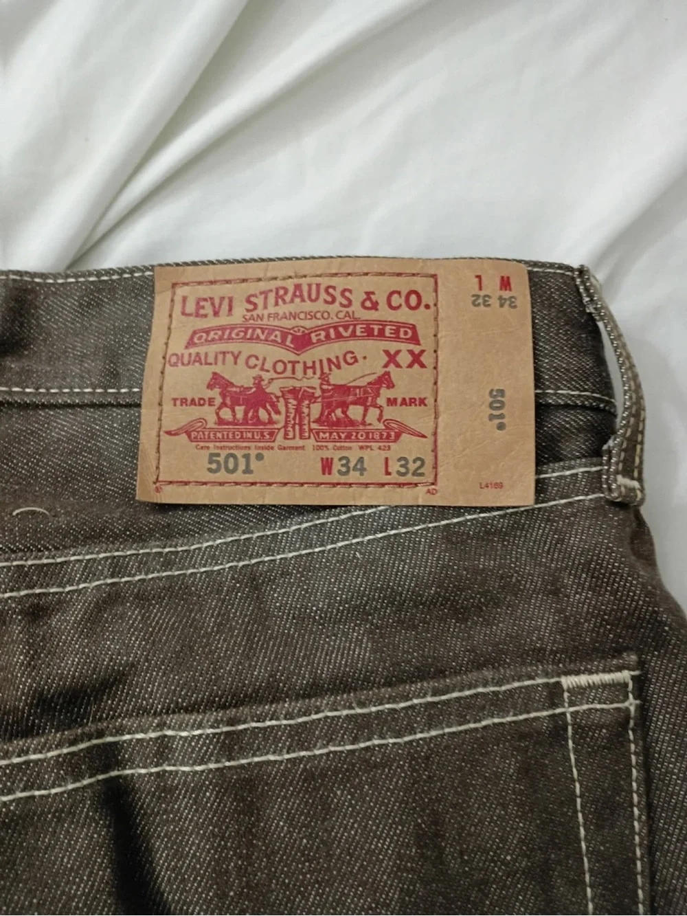 Levi's brown straight-leg jeans with contrast stitching
